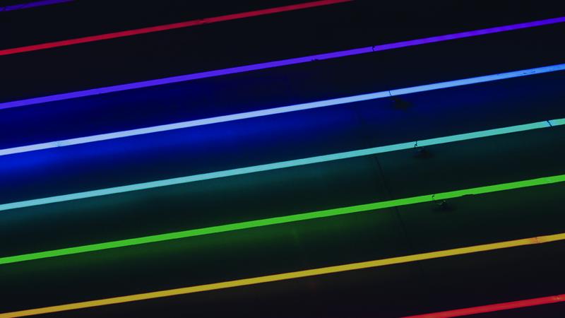 Neon stripes on a block background.